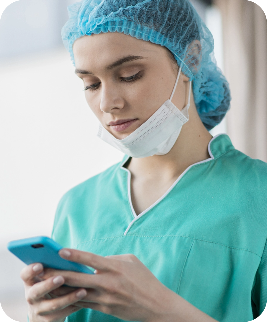 Healthcare professional reviewing duty hours on a mobile device